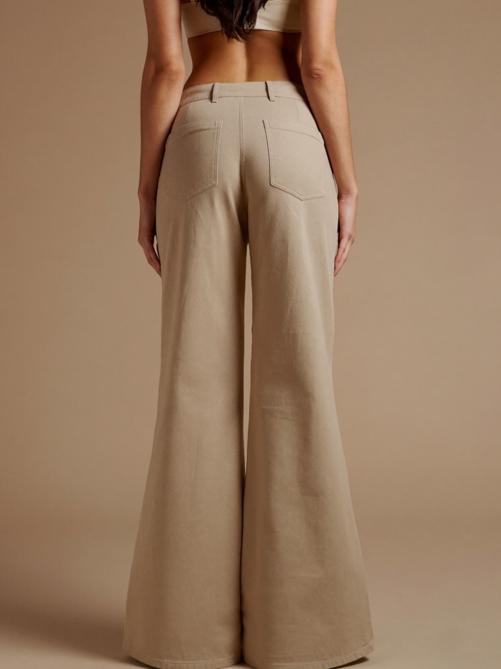 Elin Flare Trouser in Oat, back view showing the high rise and back pockets.