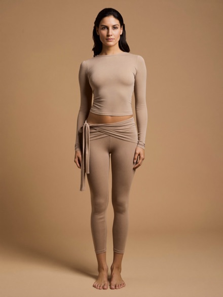Ivy Wrap Top in Bone, tied at the waist over matching leggings.