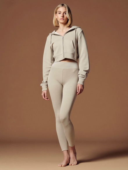 Mira Zip Hoodie in Oat, worn open over matching leggings.