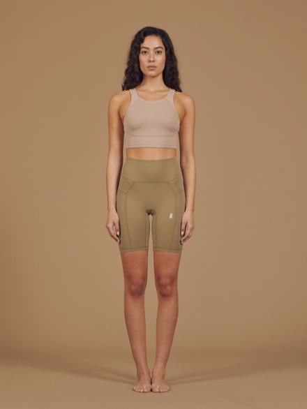 Wren Cycling Short in Nutmeg, worn with a bone cropped tank.